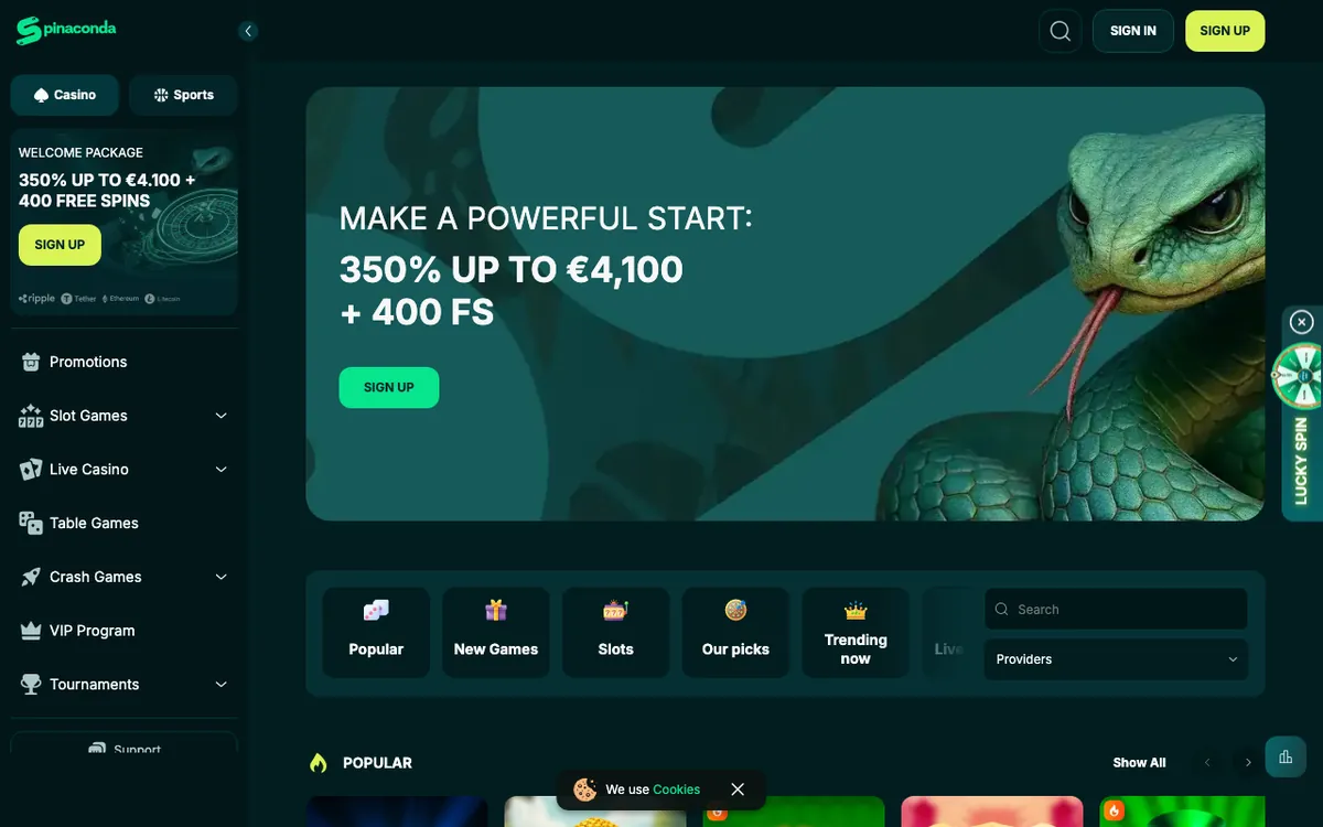 Skjermbilde av forsiden til Spinaconda Casino med velkomstbonus og spillutvalg